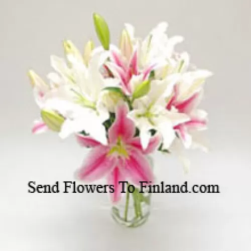 Mixed Colored Lilies In A Vase