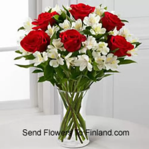 7 Red Roses With Assorted White Flowers And Fillers In A Glass Vase